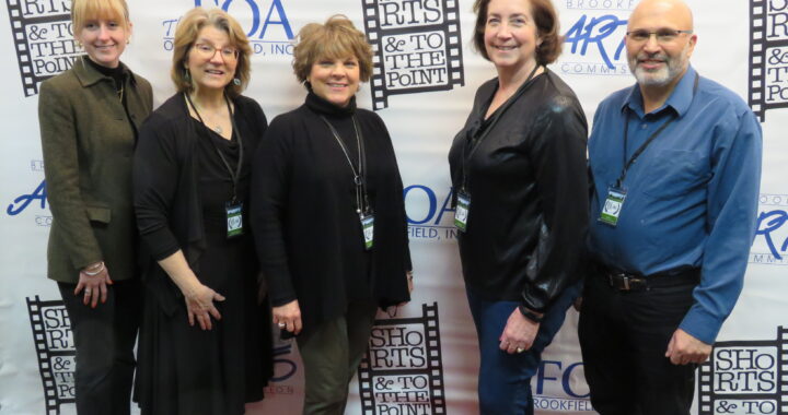 Members of the Brookfield Arts Commission pose together on the red carpet at the 2022 short film festival.